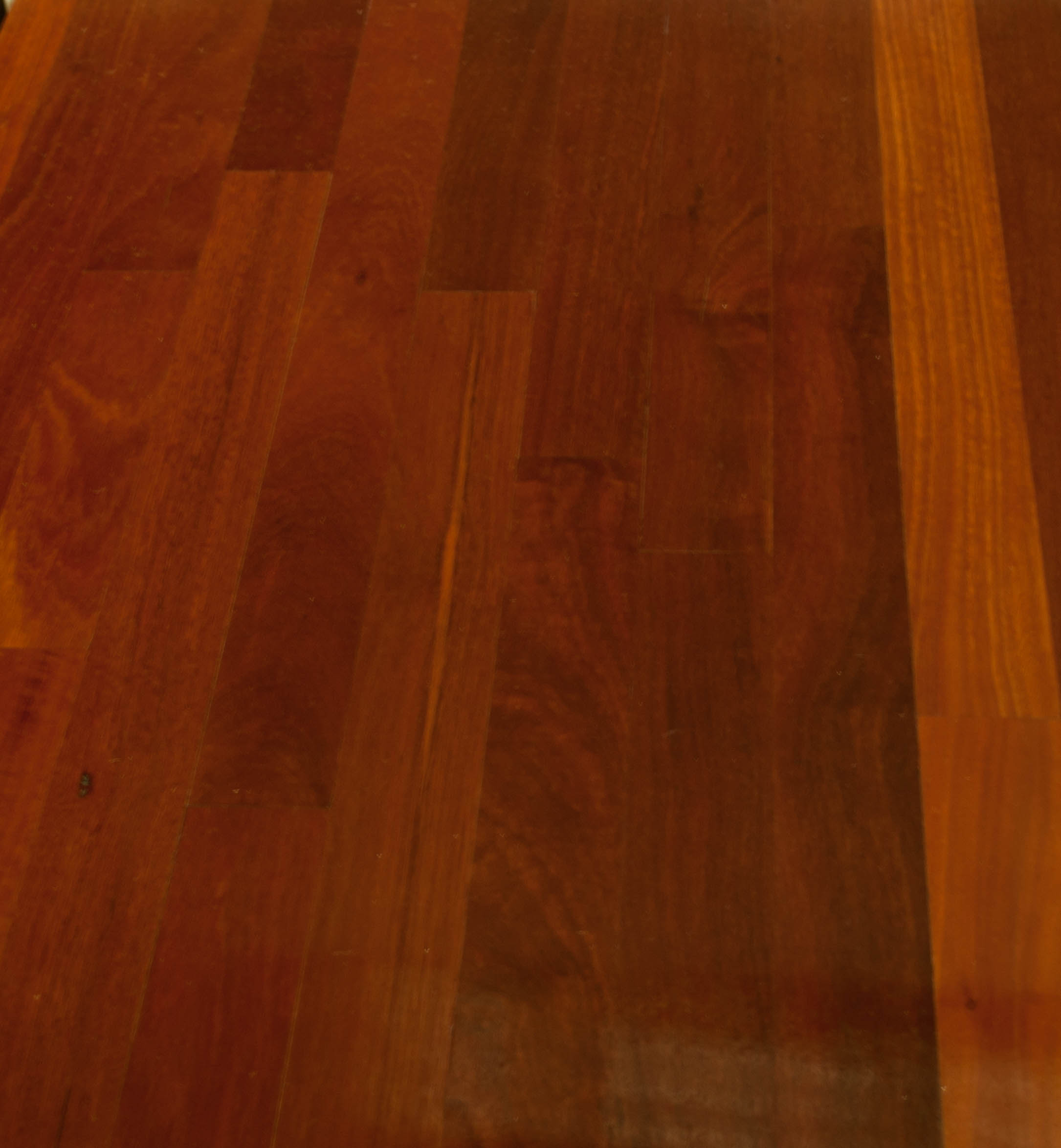showing a deep orange red timber species hardwood floor.
