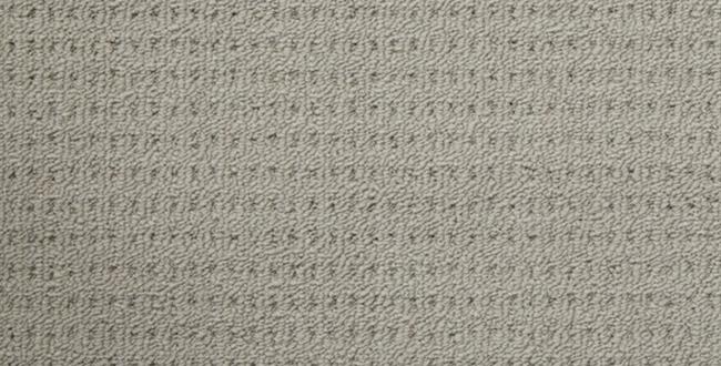 showing a sample piece of carpet, it being of a light green color, embossed loop pile, polypropelene yarn carpet on sale at Concord Floors.