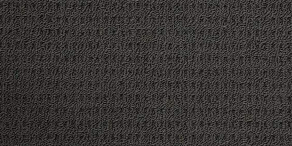 showing Concord Floor's a charcoal coloured, embossed looppile, polypropelene carpet, on sale at Concord Floors.