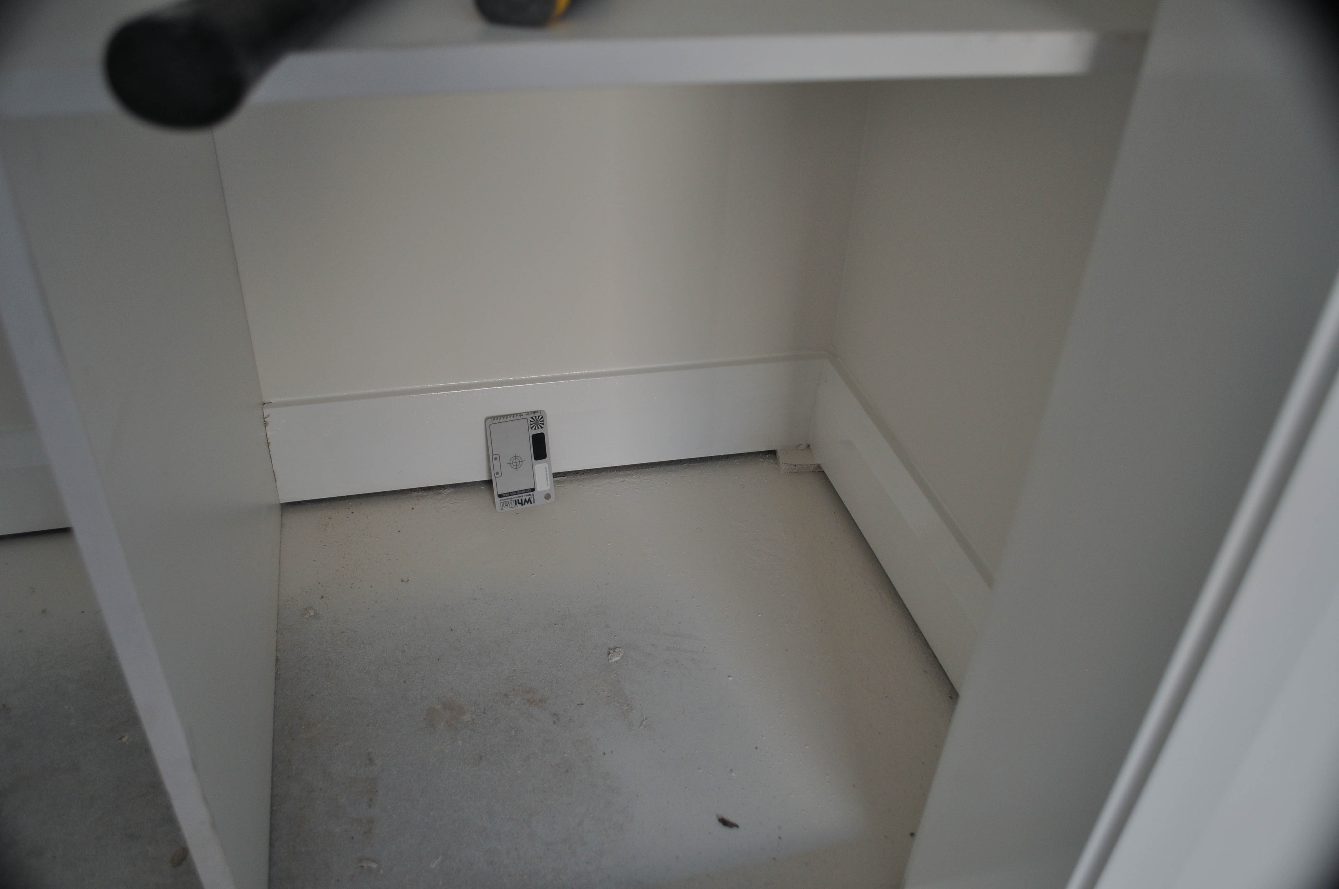 a wardrobe floor in a room, that needs preparatory waste material removal, including wedges that are protruding from under the skirting boards,
 and cleaning in a house, in Wollert, vic, where the carpet installation was done by Concord Floors.