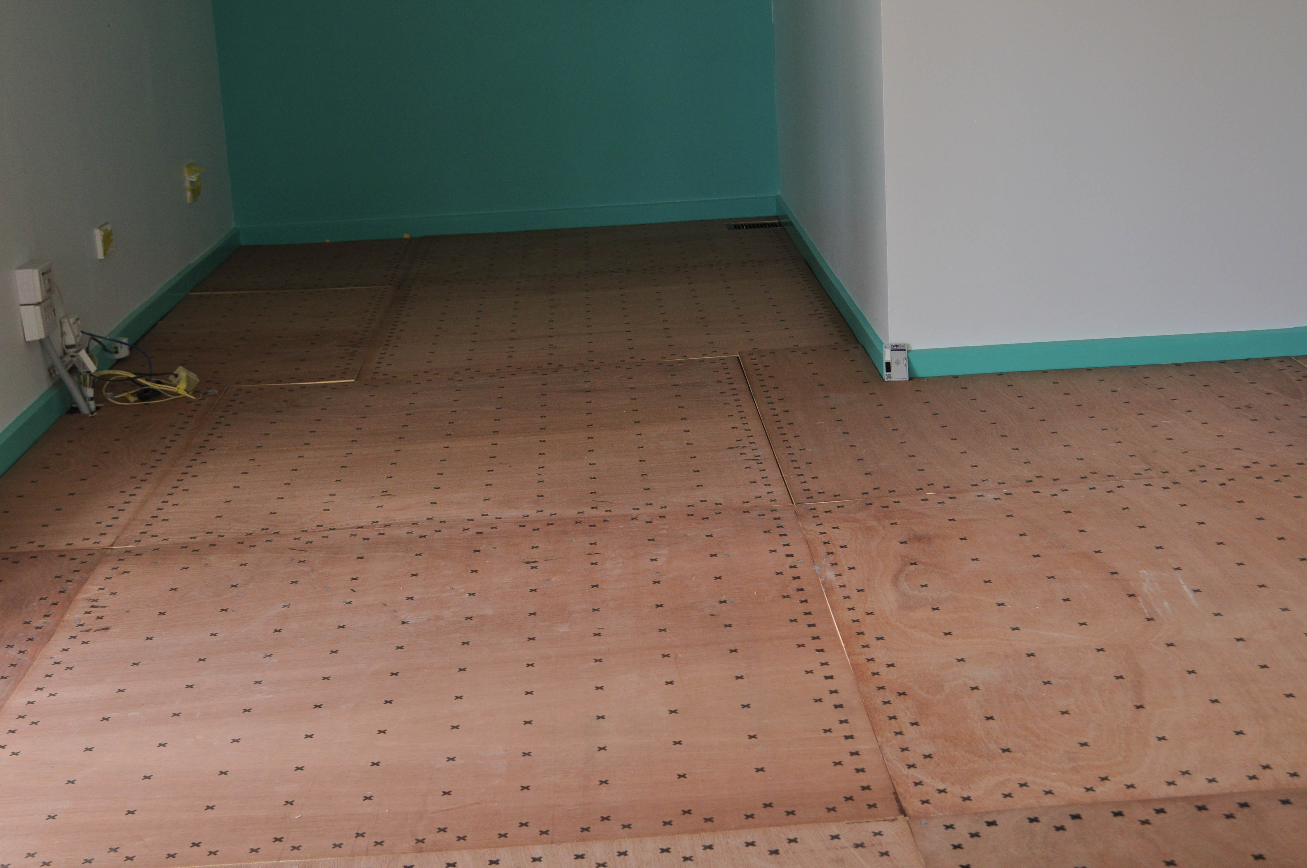 patterned, deep avender colored, carpet tile sample of the Jalan range sold and installed by Concord Floors.