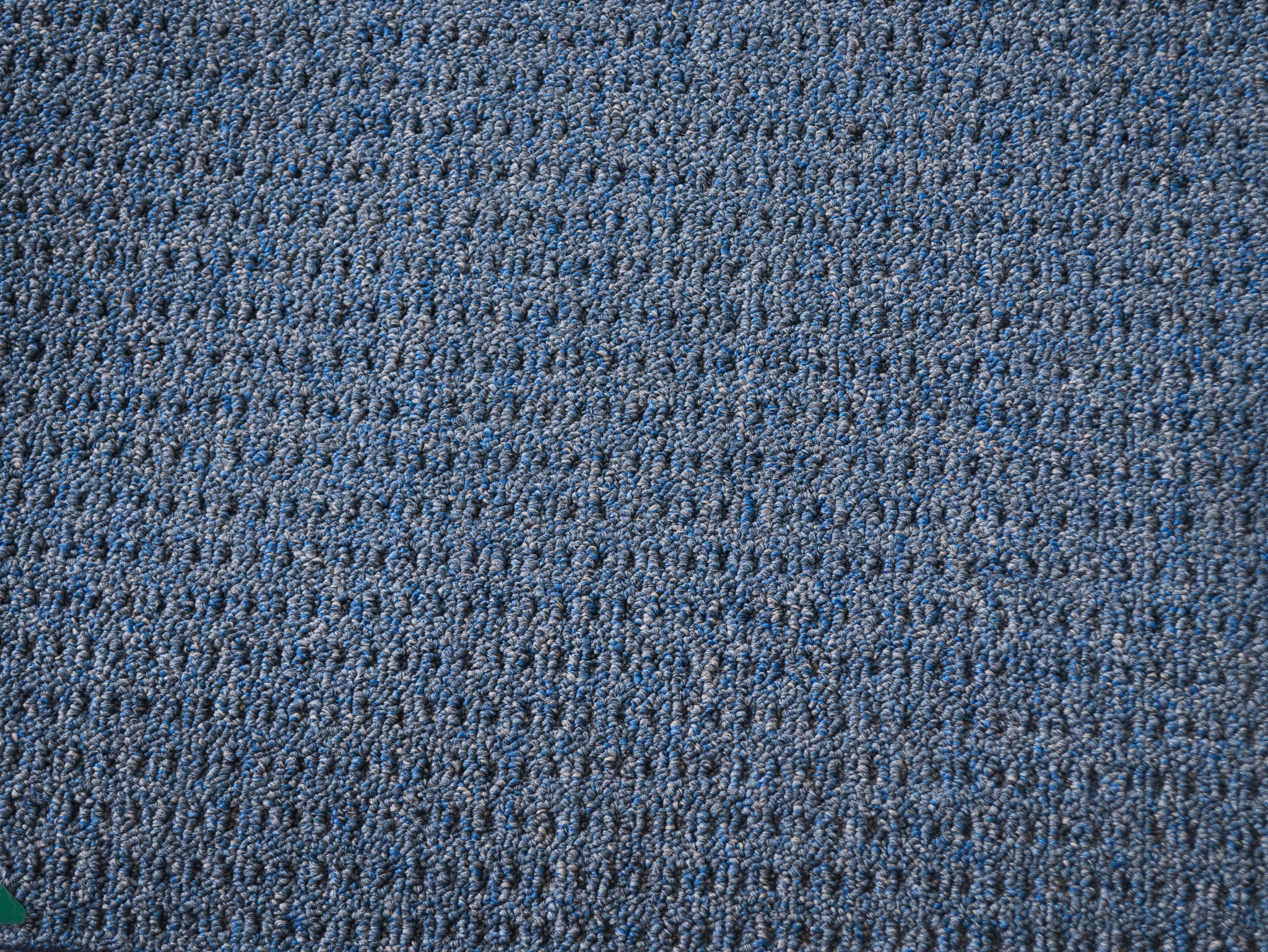 a sample of carpet of a specific color in the carpet range in the range serenity.