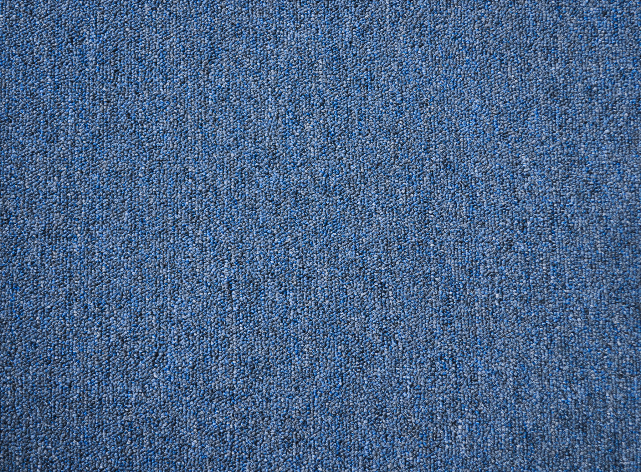 a sample of carpet of the denim color in the carpet range useful vallet.