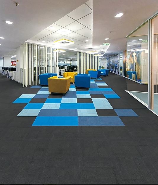 patterned, colorful carpet squares, of the PENTLAND range laid on an office floor on sale at Concord Floors.