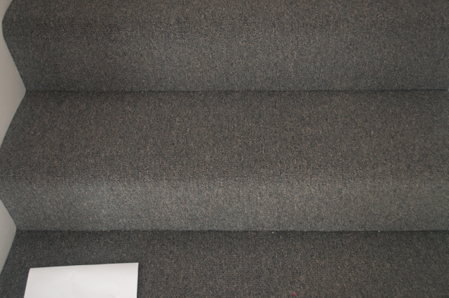 finished carpet laying of staircase.