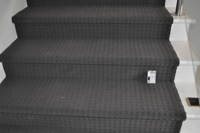 a staircase in room in the interior of a period home utilizing, a patterned polypropelene gark grey carpet. The carpet was laid by
Concord Floors. The home is in Melton, Vic 3037.