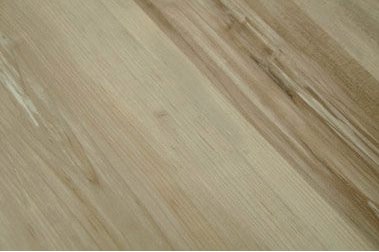a photo of sample board of laminate flooring, 8mm thick laminate flooring  board, of inovar brand color (INV2-5)
 available to the public to buy Concord Floors and if they wish have it installed by Concord Floors.
