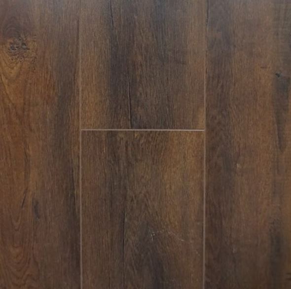 a photo of sample board of laminate flooring, 12mm thick laminate flooring  board, of a brand and color (GE-B-COGNAC)
 available to the public to buy from Concord Floors