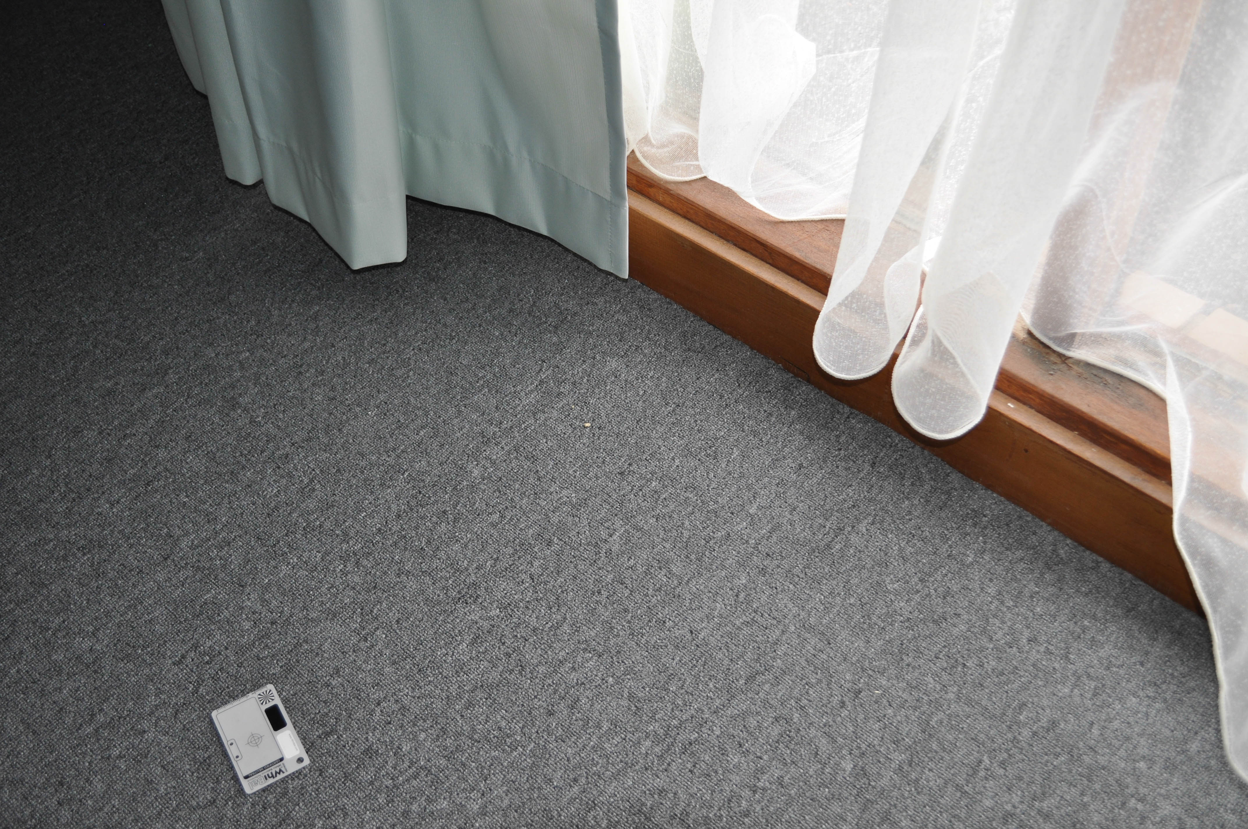 a room in a Williamstown home, with a plain level loop pile, grey colored, commercial carpet on the floor, sold and installed by Concord Floors of the
 Aussie Bahar range.