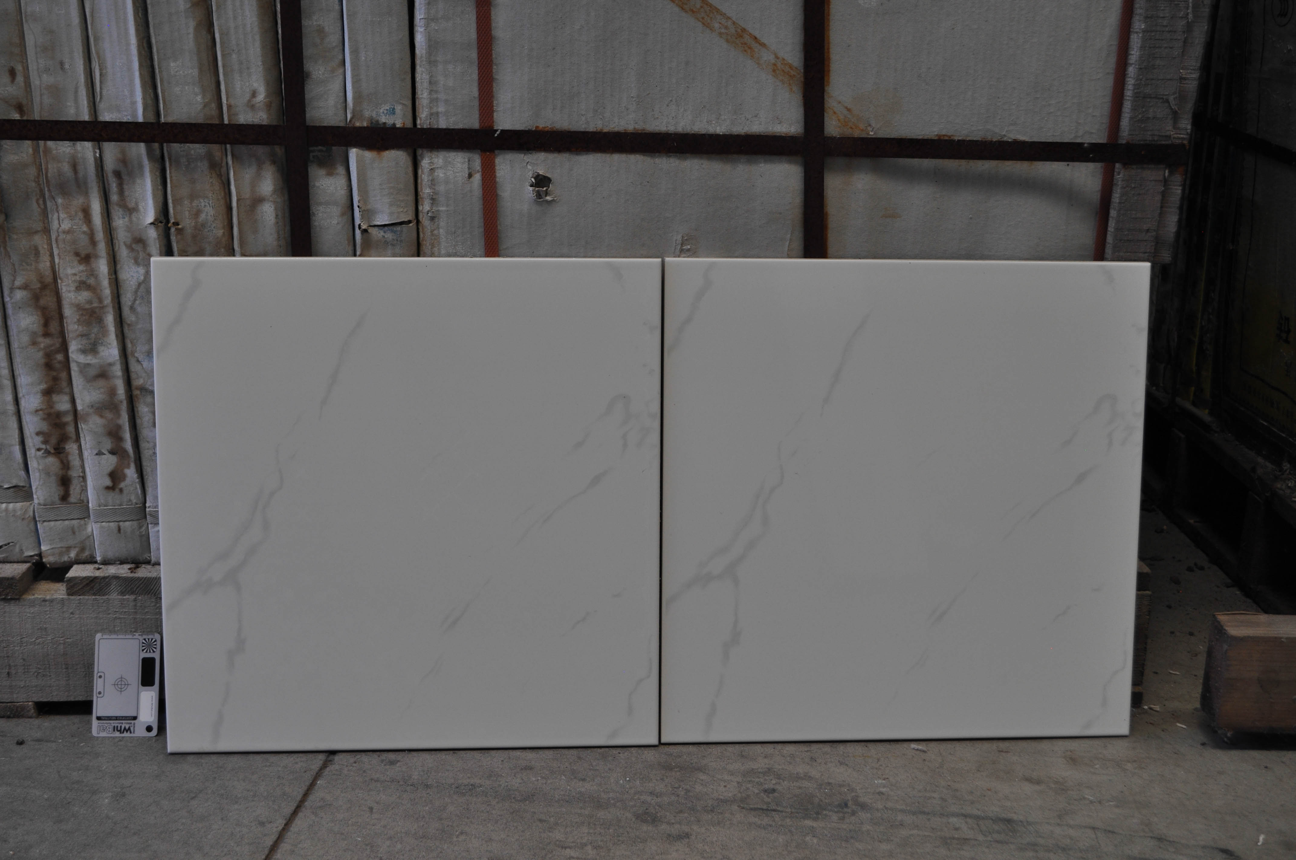 a sales sample of a 60cm x 60cm porcelain tile available for purchase from Concord Floors